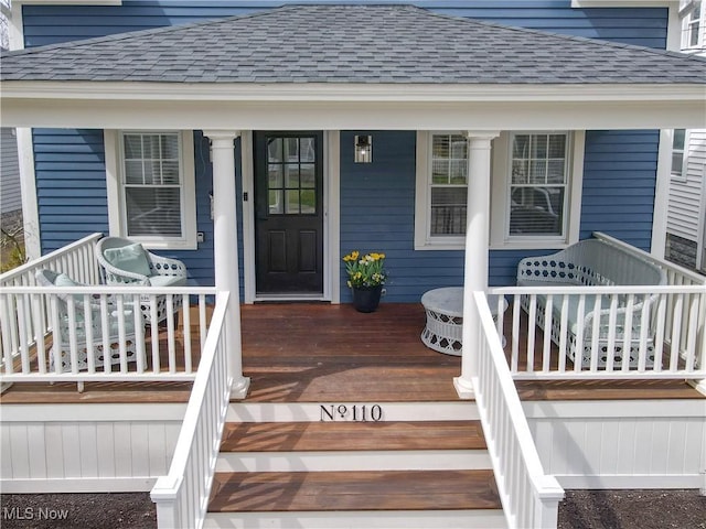 110 May Ct, Chagrin Falls, OH 44022 - entrance to property with a shingled roof and covered porch