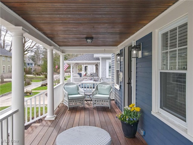 wooden deck featuring a porch