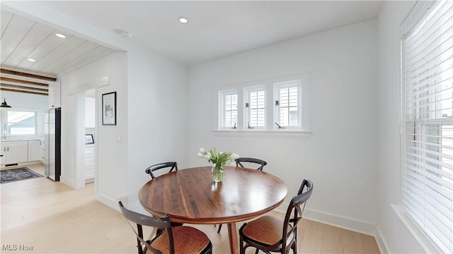 dining area with recessed lighting, light wood-style floors, and plenty of natural light