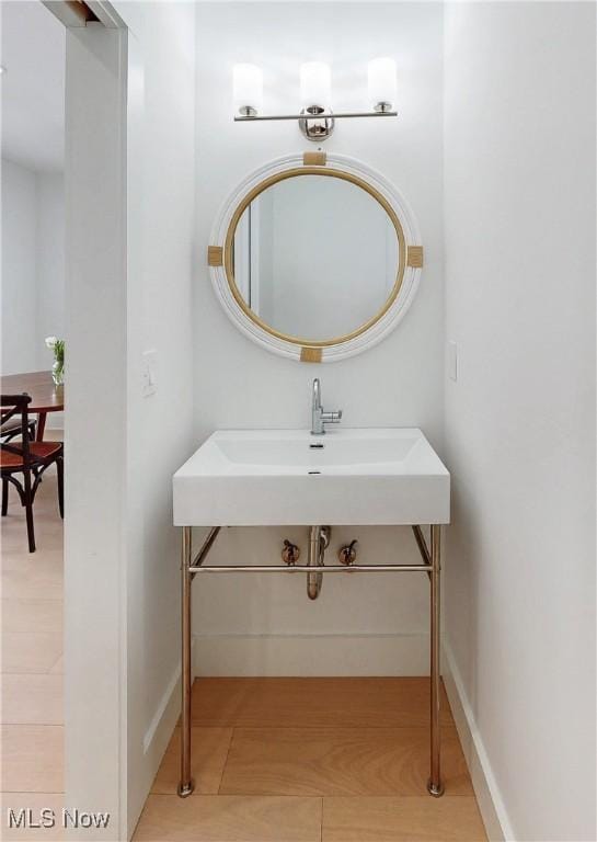 110 May Ct, Chagrin Falls, OH 44022 - bathroom with tile patterned flooring and baseboards