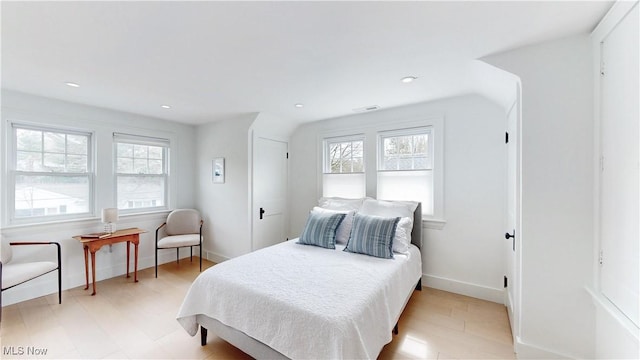 bedroom featuring visible vents and baseboards