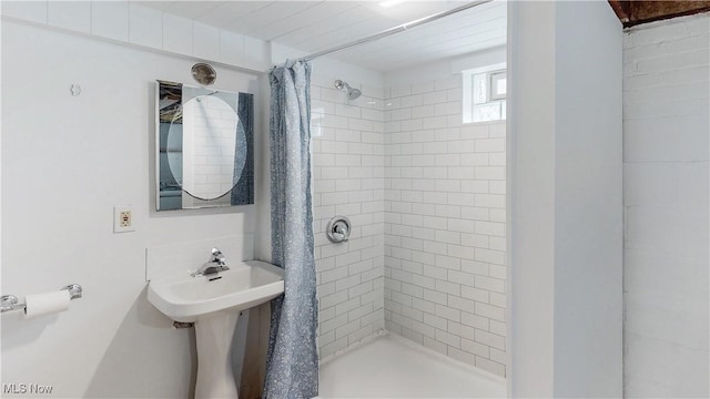 full bath featuring a stall shower