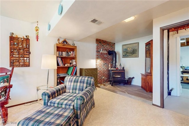 220 Bantam Ridge Ct, Wintersville, OH 43953 - living area featuring a wood stove, visible vents, and carpet floors