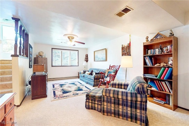 220 Bantam Ridge Ct, Wintersville, OH 43953 - living area with visible vents, stairway, carpet flooring, a ceiling fan, and baseboard heating