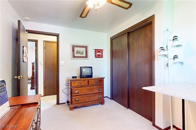 220 Bantam Ridge Ct, Wintersville, OH 43953 - bedroom featuring light colored carpet, a closet, and a ceiling fan