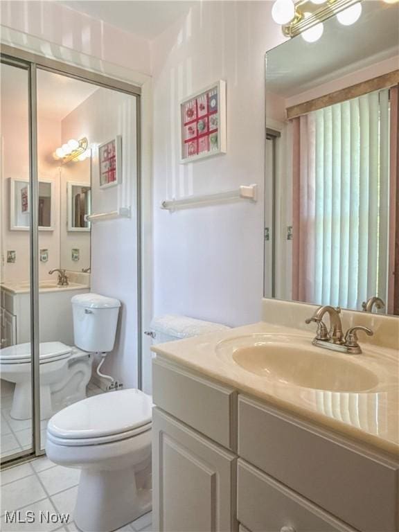 220 Bantam Ridge Ct, Wintersville, OH 43953 - bathroom with tile patterned flooring, toilet, and vanity