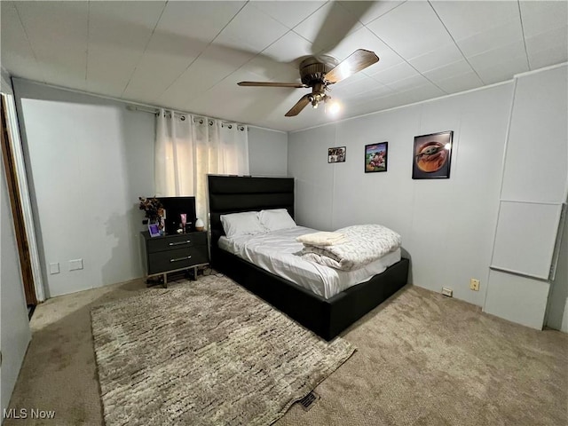 bedroom featuring a ceiling fan and carpet floors