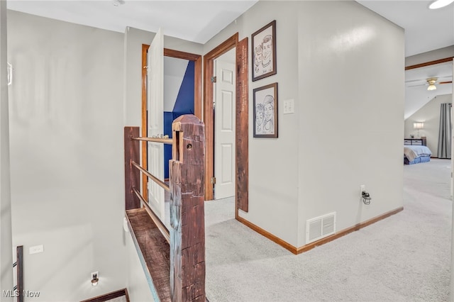 39233 Jones Rd, Litchfield, OH 44253 - corridor with visible vents, baseboards, and carpet floors