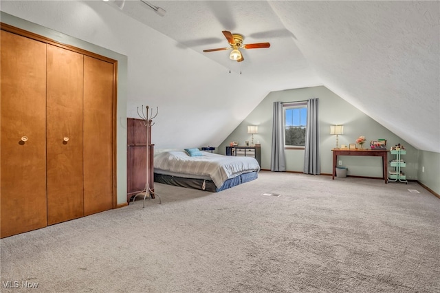 39233 Jones Rd, Litchfield, OH 44253 - carpeted bedroom featuring ceiling fan, a textured ceiling, and lofted ceiling