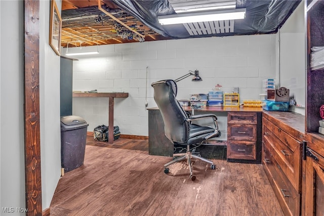 39233 Jones Rd, Litchfield, OH 44253 - office with wood finished floors and concrete block wall