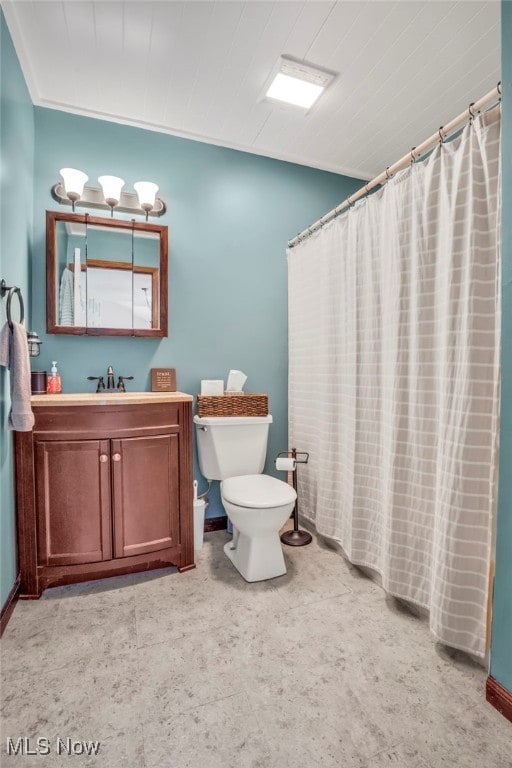 39233 Jones Rd, Litchfield, OH 44253 - full bath with curtained shower, toilet, and vanity