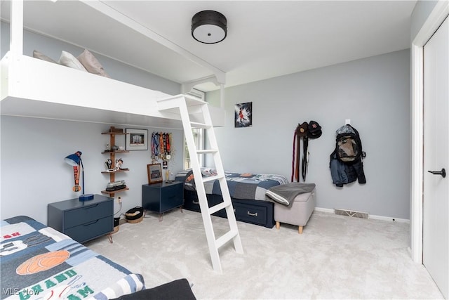 carpeted bedroom with visible vents