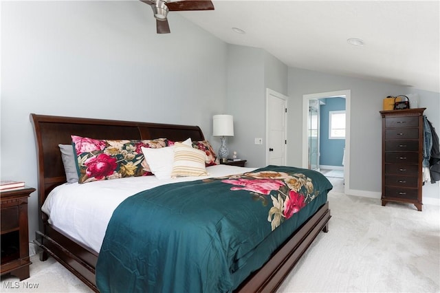 bedroom with lofted ceiling, light colored carpet, and ceiling fan