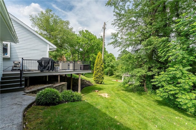 view of yard featuring a deck