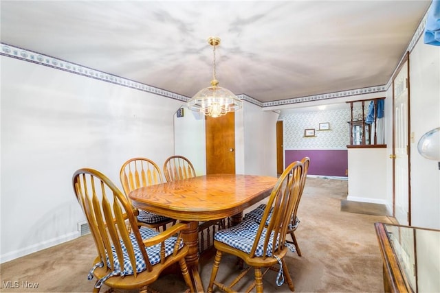 dining space featuring baseboards, wallpapered walls, an inviting chandelier, and carpet floors