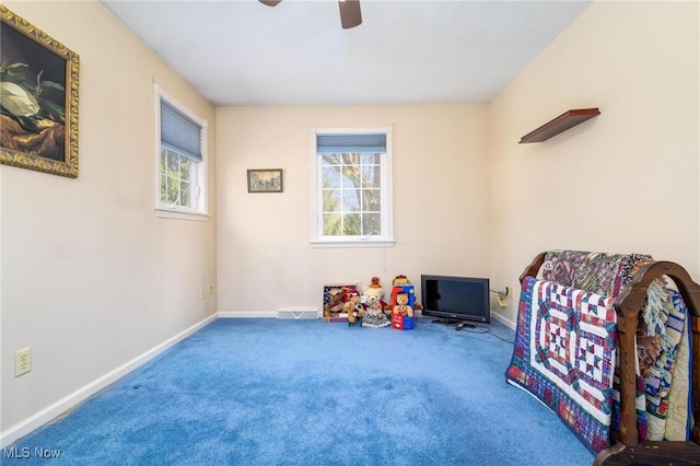 265 Putnam Ln, Weirton, WV 26062 - living area featuring carpet, baseboards, and a ceiling fan