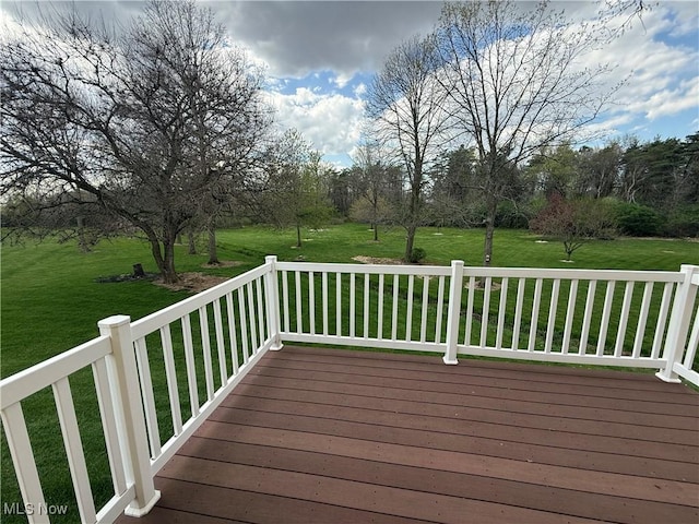 deck featuring a lawn