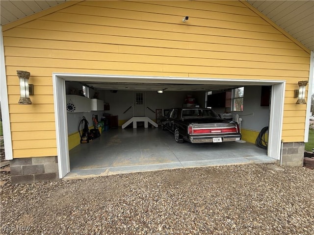 garage featuring driveway