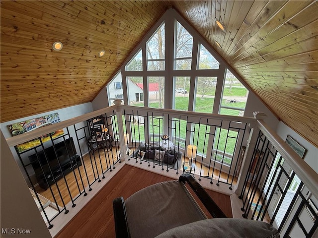 interior space featuring high vaulted ceiling, wood finished floors, and wood ceiling
