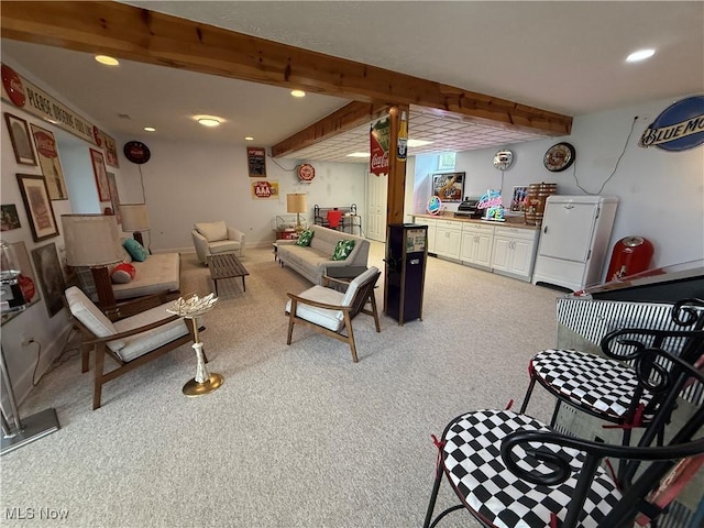 living room with recessed lighting, beamed ceiling, and light colored carpet