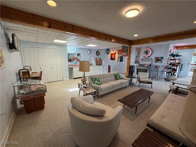 living area featuring recessed lighting, carpet floors, and baseboards