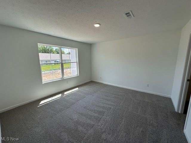 414 Honeycrisp Dr NE, Louisville, OH 44641 - unfurnished room with carpet and baseboards