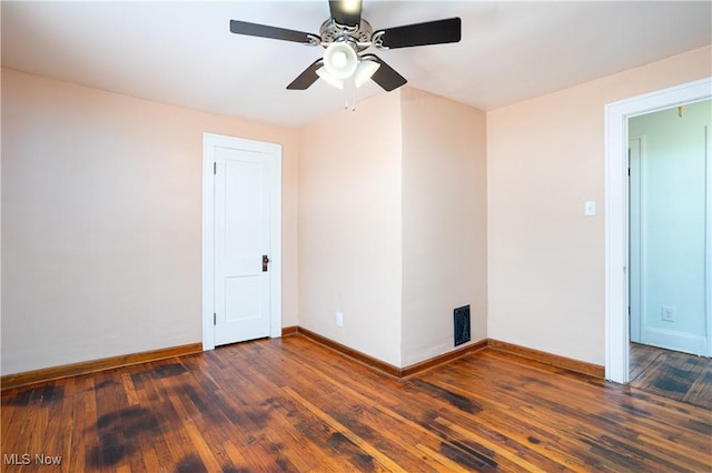 9612 Park Heights Ave, Garfield Heights, OH 44125 - spare room featuring baseboards, visible vents, a ceiling fan, and wood-type flooring