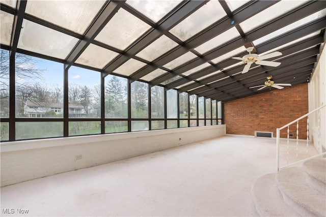 unfurnished sunroom with visible vents
