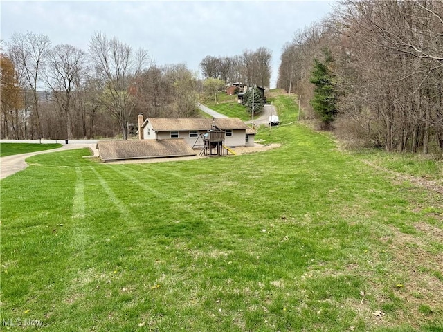 83 Oneida Trl, Malvern, OH 44644 - view of community featuring a lawn