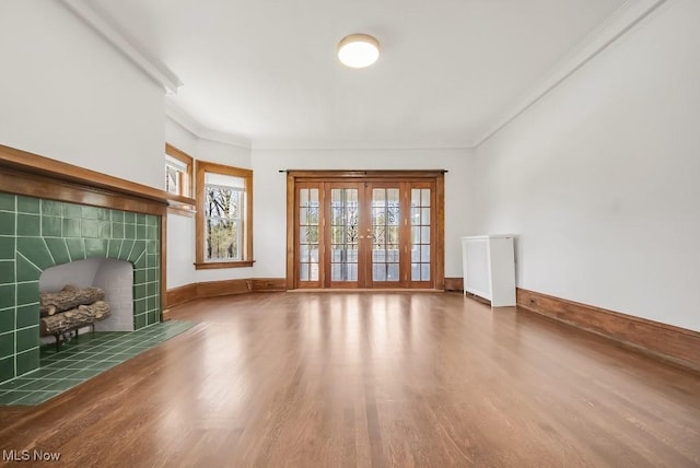 1357 E Blvd Unit 2, Cleveland, OH 44106 - unfurnished living room with wood finished floors, crown molding, and baseboards