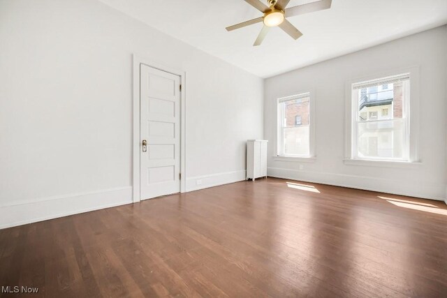 1357 E Blvd Unit 2, Cleveland, OH 44106 - spare room featuring ceiling fan, wood finished floors, and baseboards