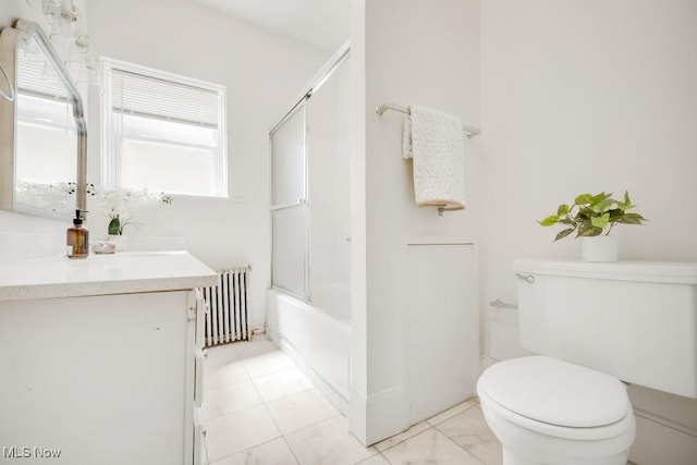1357 E Blvd Unit 2, Cleveland, OH 44106 - full bath featuring toilet, radiator heating unit, enclosed tub / shower combo, and vanity
