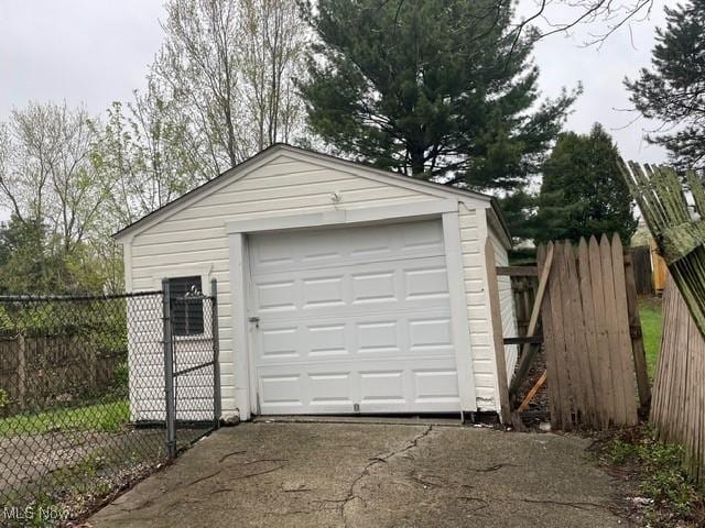 1145 Arnold Ave, Akron, OH 44305 - detached garage featuring fence and aphalt driveway