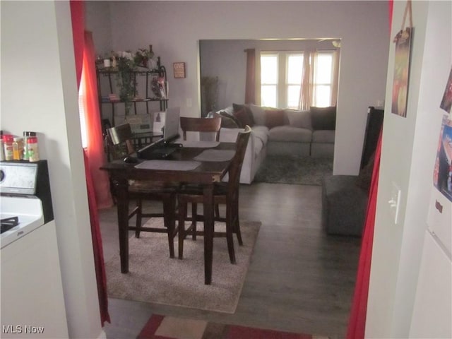 dining room with wood finished floors