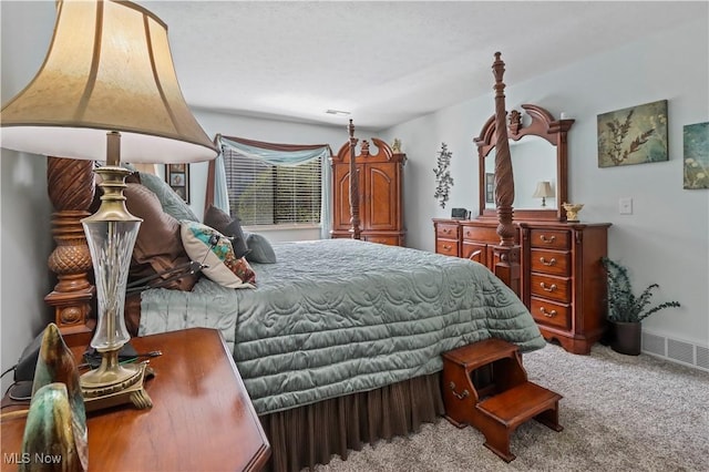 carpeted bedroom with visible vents