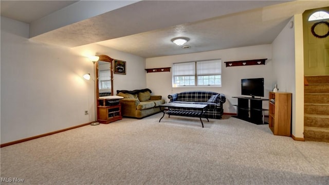 living room featuring carpet, stairway, and baseboards