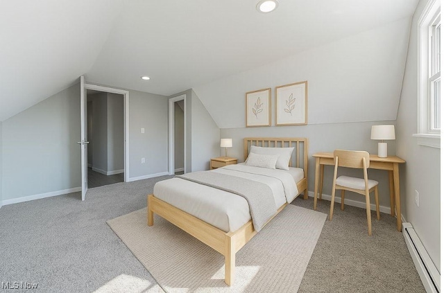 carpeted bedroom with baseboard heating, recessed lighting, baseboards, and vaulted ceiling