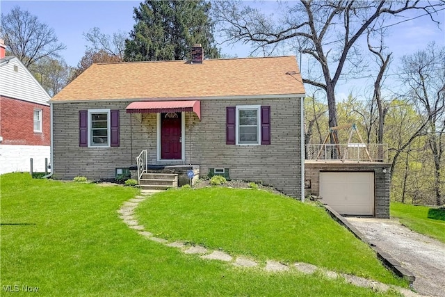 bungalow featuring driveway, a chimney, a front yard, and brick siding