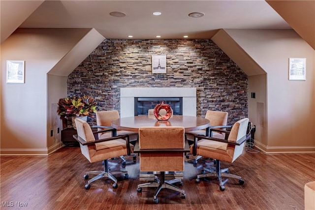 3601 Chapelton Ct, Richfield, OH 44286 - dining room featuring a glass covered fireplace, baseboards, wood finished floors, and recessed lighting