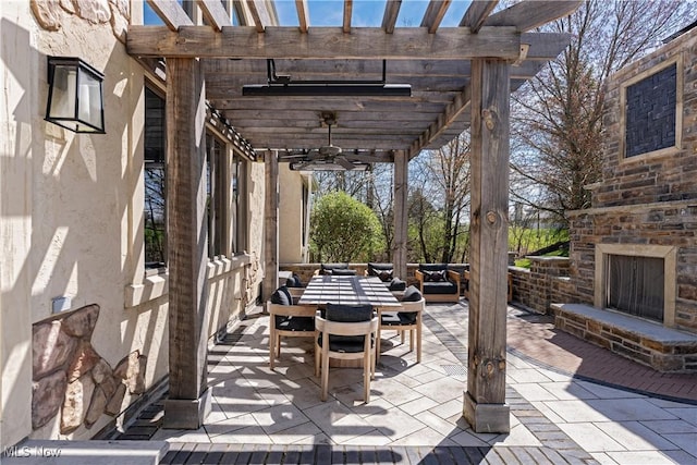 3601 Chapelton Ct, Richfield, OH 44286 - view of patio / terrace with exterior fireplace, outdoor dining space, ceiling fan, and a pergola