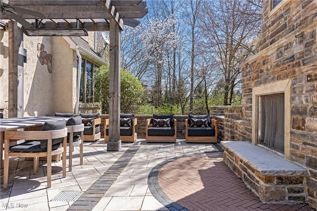 3601 Chapelton Ct, Richfield, OH 44286 - view of patio / terrace with an outdoor living space with a fireplace and a pergola