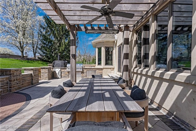 3601 Chapelton Ct, Richfield, OH 44286 - view of patio / terrace featuring exterior kitchen, outdoor dining space, a pergola, ceiling fan, and area for grilling
