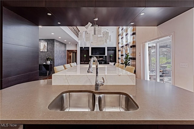 3601 Chapelton Ct, Richfield, OH 44286 - kitchen with a sink, open floor plan, an island with sink, and recessed lighting