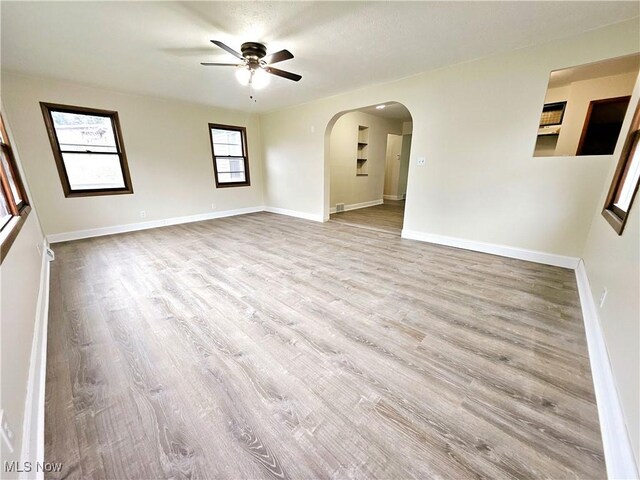 1893 Ridge Rd, Hinckley, OH 44233 - empty room with baseboards, wood finished floors, and ceiling fan