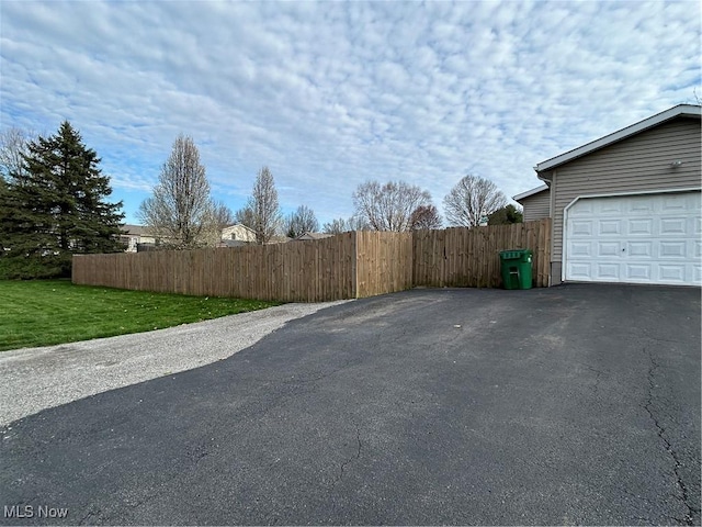 view of road with driveway