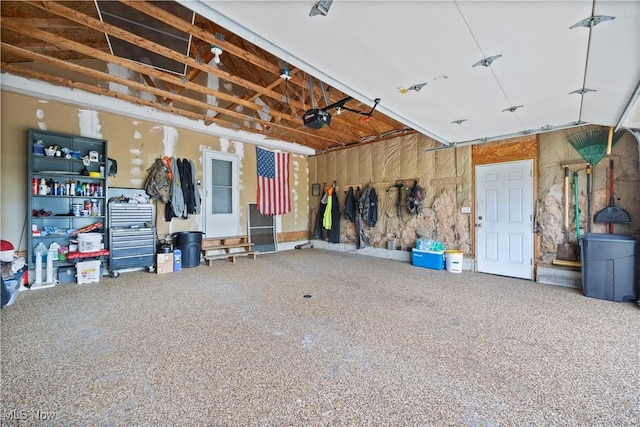 garage featuring a garage door opener