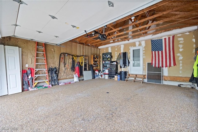 garage featuring a garage door opener