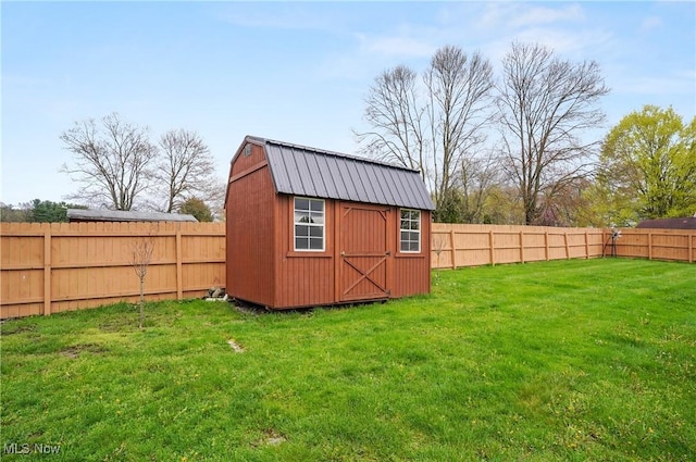 view of shed featuring a fenced backyard