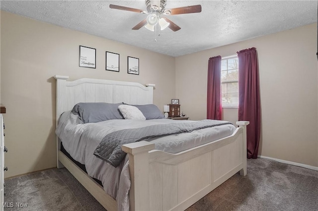 carpeted bedroom featuring baseboards, a ceiling fan, and a textured ceiling