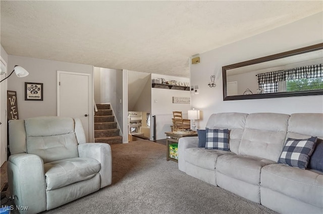 carpeted living area with stairway